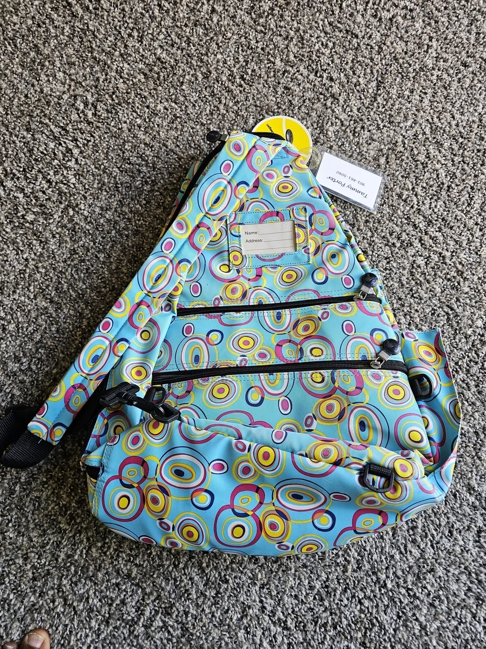 Jetpac Colorful Circle Print Sling Backpack - Turquoise, Yellow, Pink